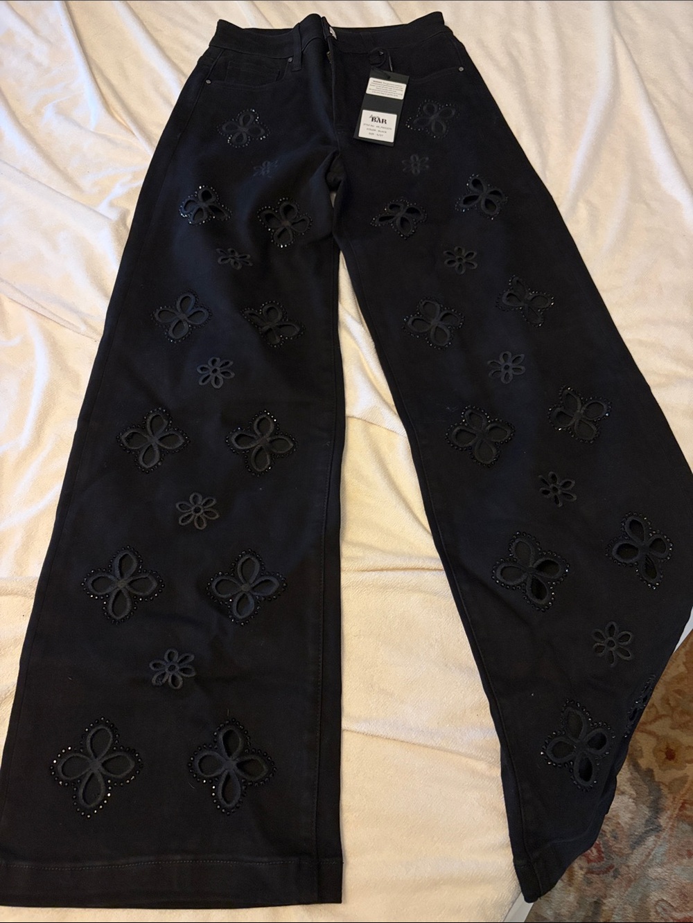 Black Wide-Leg Jeans with Floral Cutouts and Stud Detail